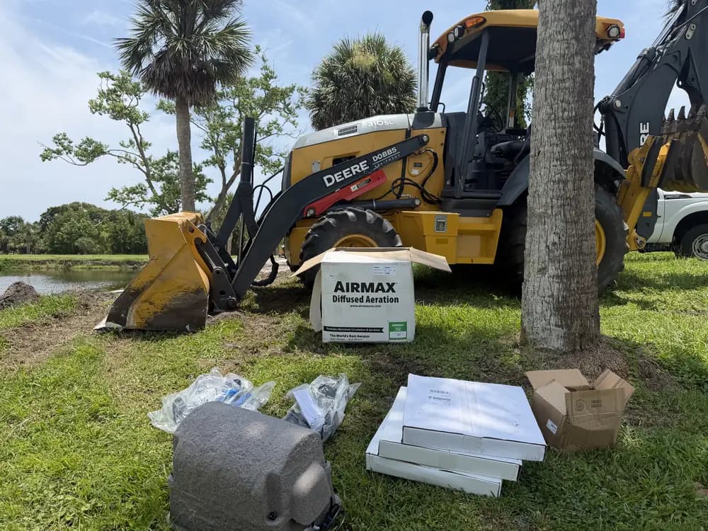 Aeration system installation on a Florida pond