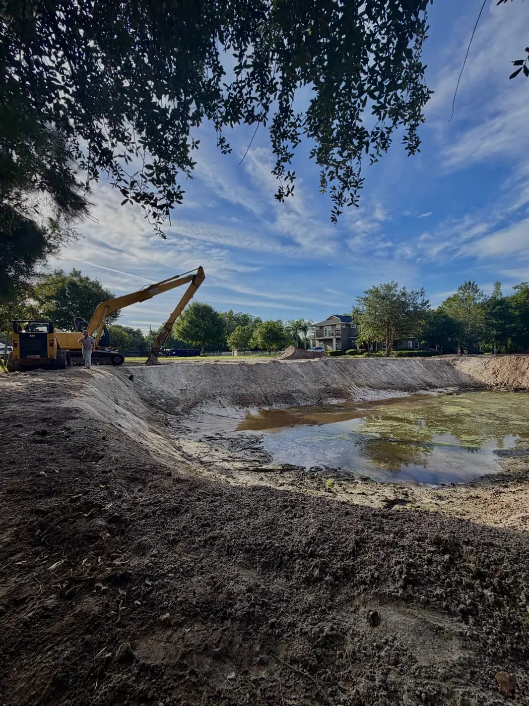 Florida lake restoration project with cypress-lined water