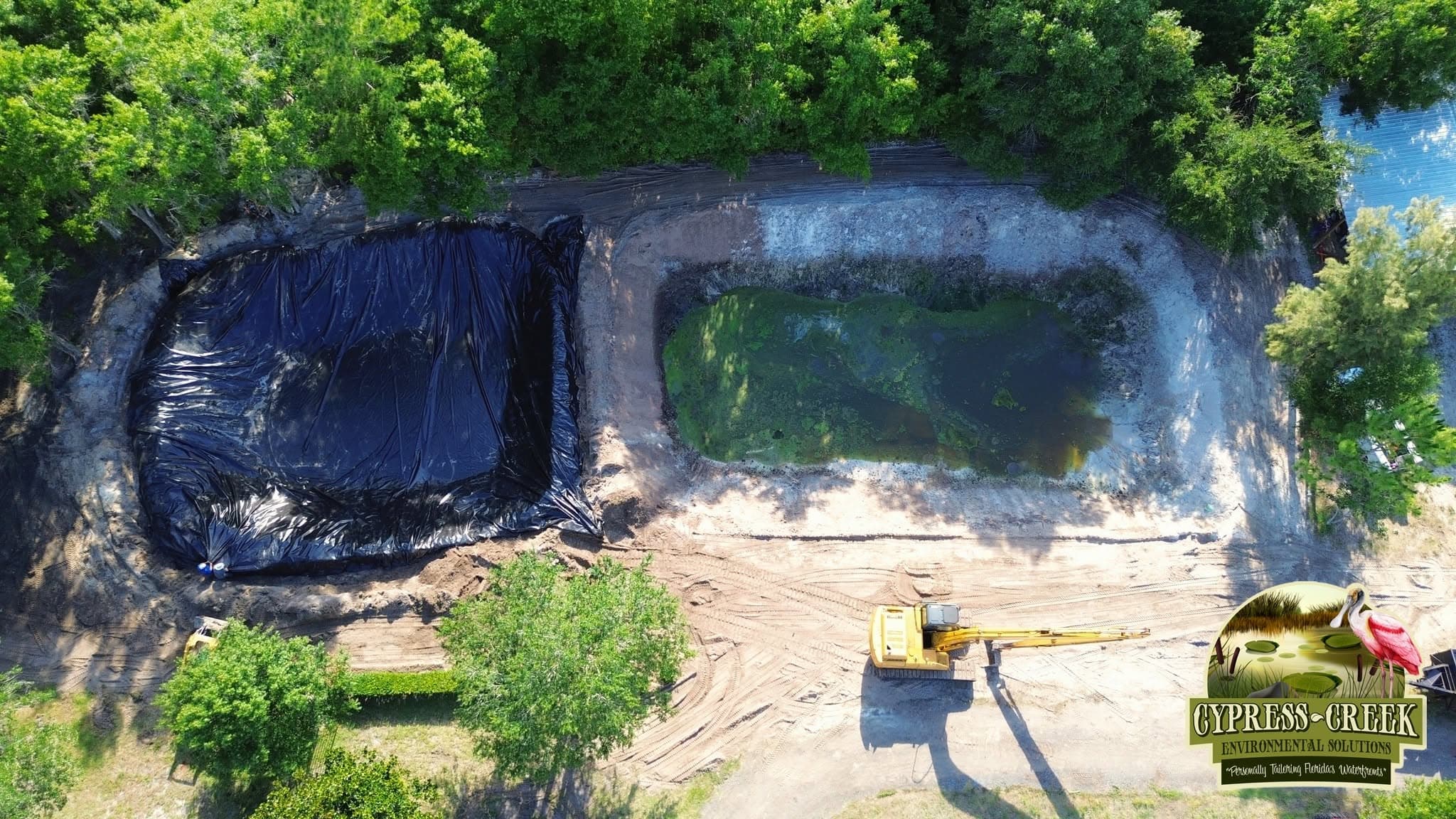 Stormwater management structure beside a managed Central Florida waterway